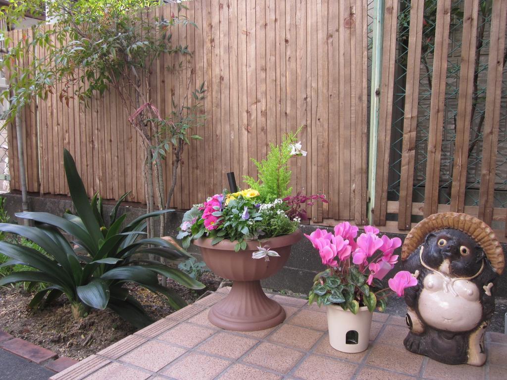 Enman Guest House Osaka Moriguchi Exterior photo