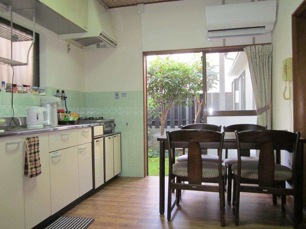 Enman Guest House Osaka Moriguchi Exterior photo