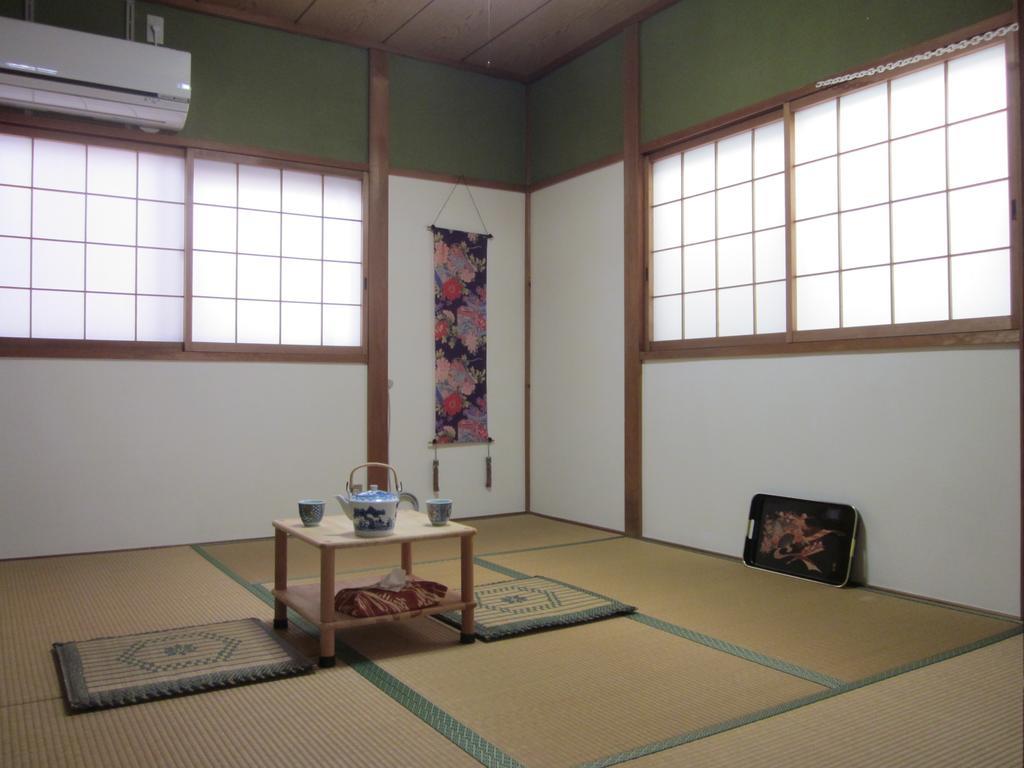 Enman Guest House Osaka Moriguchi Exterior photo